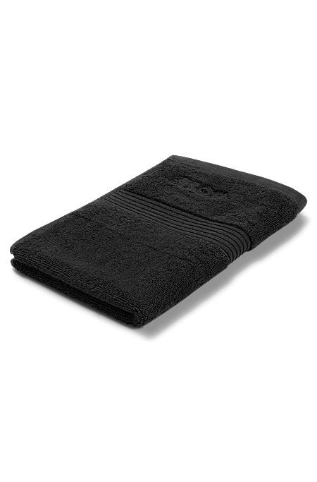 Gastenhanddoek van zwarte Egeïsche katoen met ton-sur-ton logo, Zwart