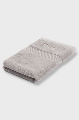 Cotton guest towel in silver with embroidered logo, Silver