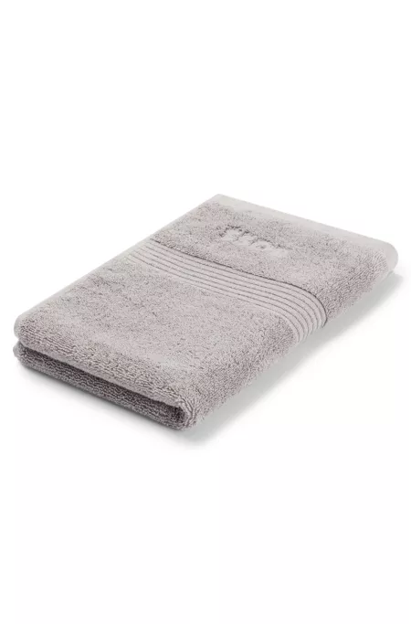 Cotton guest towel in silver with embroidered logo