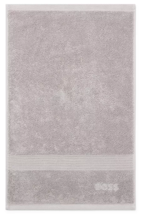 Cotton guest towel in silver with embroidered logo