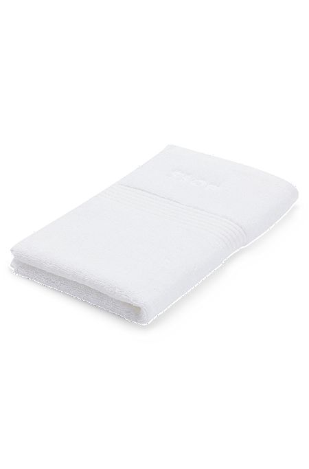 White Aegean-cotton guest towel with tonal logo, White