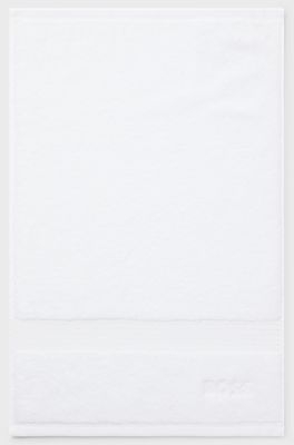 White cotton guest towel with embroidered logo, White