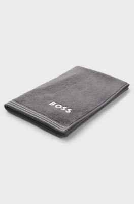 Cotton guest towel with contrast embroidered logo, Dark Grey