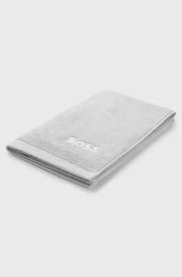 Katoenen gastenhanddoek met logostiksel als contrast, Zilver