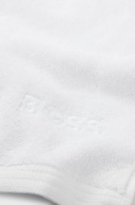 Katoenen gastenhanddoek met logostiksel als contrast, Wit