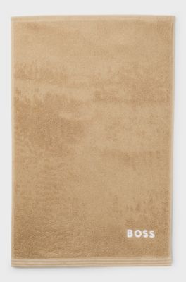 Katoenen gastenhanddoek met logostiksel als contrast, Beige