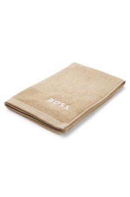 Cotton guest towel with contrast embroidered logo, Beige