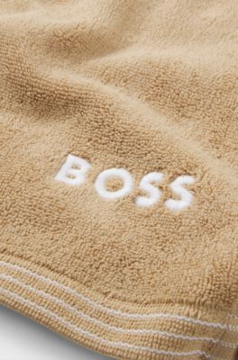Cotton guest towel with contrast embroidered logo, Beige