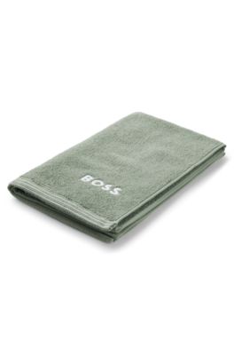 Cotton guest towel with contrast embroidered logo, Green