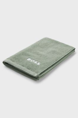 Cotton guest towel with contrast embroidered logo, Green
