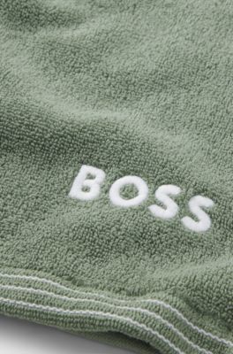 Cotton guest towel with contrast embroidered logo, Green