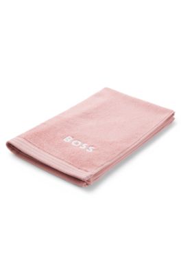 Cotton guest towel with contrast embroidered logo, light pink