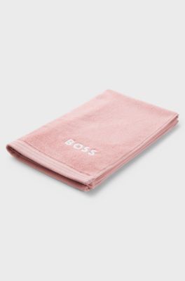 Katoenen gastenhanddoek met logostiksel als contrast, Lichtroze
