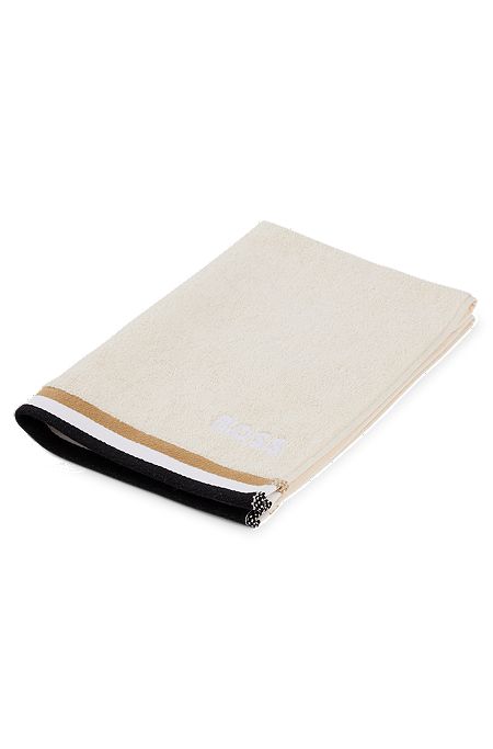 Cotton-jacquard guest towel with piping and logo, Light Beige