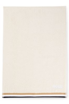 Cotton-jacquard guest towel with piping and logo, Light Beige