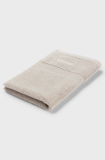Aegean-cotton guest towel with tonal logo, Beige