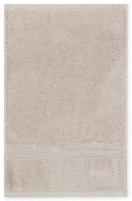 Aegean-cotton guest towel with tonal logo, Beige