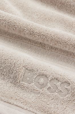 Aegean-cotton guest towel with tonal logo, Beige
