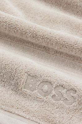 Serviette de toilette en coton avec logo brod&eacute; ton sur ton, Beige
