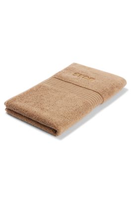 Aegean-cotton guest towel with tonal logo, Brown