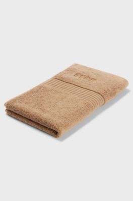 Serviette de toilette en coton avec logo brod&eacute; ton sur ton, Marron