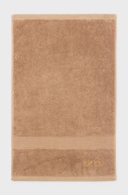 Aegean-cotton guest towel with tonal logo, Brown