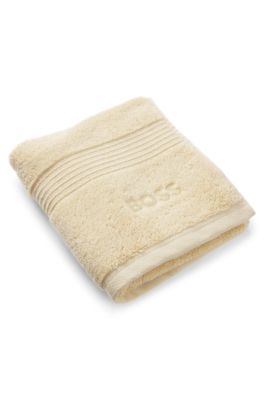 G&auml;stehandtuch aus &auml;g&auml;ischer Baumwolle mit tonalem Logo, Beige