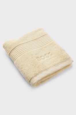 Cotton guest towel with tonal embroidered logo, Beige