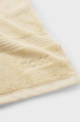 Aegean-cotton guest towel with tonal logo, Beige