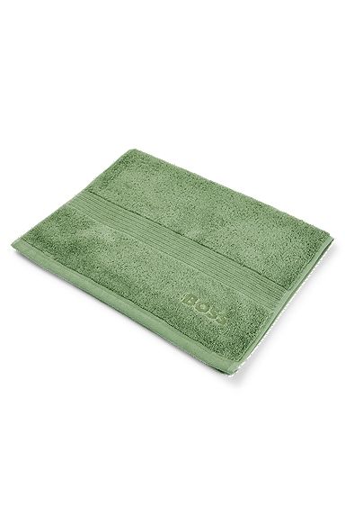 Aegean-cotton guest towel with tonal logo, Green
