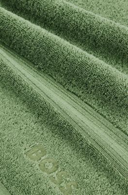 Asciugamano per ospiti in cotone egeo con logo tono su tono, Verde
