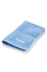 Aegean-cotton guest towel with tonal logo, Blue