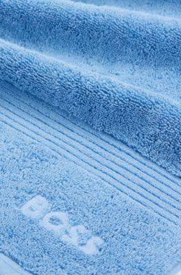 Aegean-cotton guest towel with tonal logo, Blue