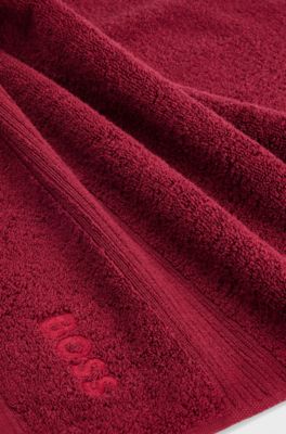Aegean-cotton guest towel with tonal logo, Dark Red