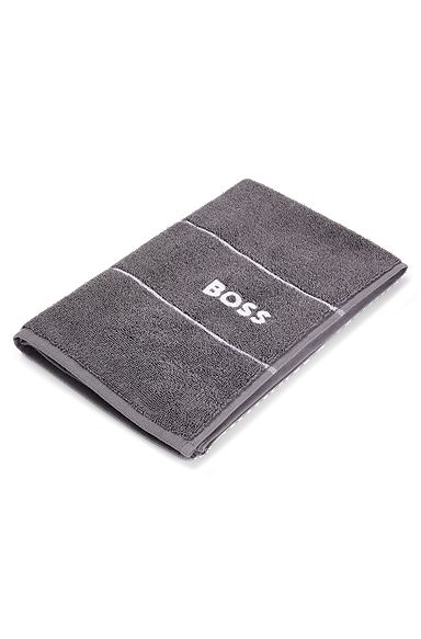 Cotton guest towel with white logo embroidery, Dark Grey