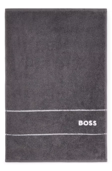 Cotton guest towel with white logo embroidery