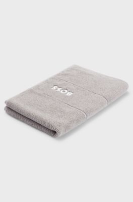 Cotton guest towel with white logo embroidery, Grey