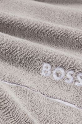 Cotton guest towel with white logo embroidery, Grey