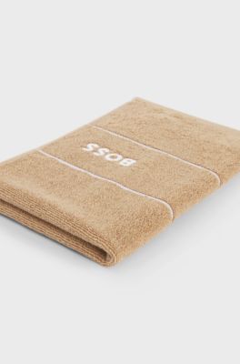 Asciugamano per ospiti in cotone con logo bianco ricamato, Beige