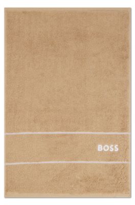 Cotton guest towel with white logo embroidery, Beige
