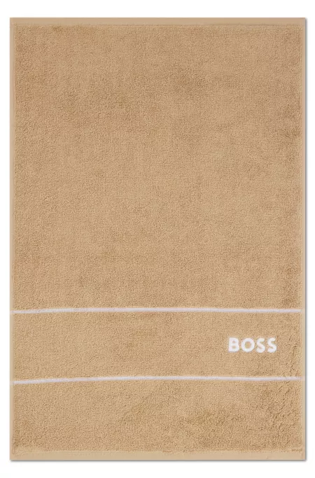 Cotton guest towel with white logo embroidery