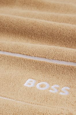 Asciugamano per ospiti in cotone con logo bianco ricamato, Beige