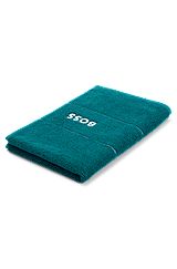 Cotton guest towel with white logo embroidery, Dark Green
