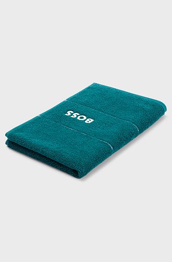 Cotton guest towel with white logo embroidery, Dark Green