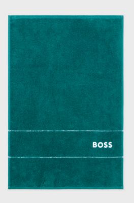 Cotton guest towel with white logo embroidery, Dark Green