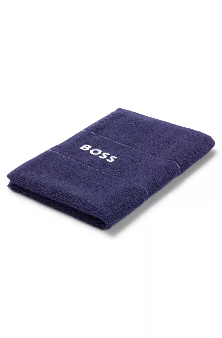 Cotton guest towel with white logo embroidery
