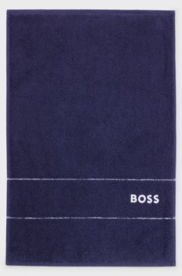 Cotton guest towel with white logo embroidery, Dark Blue