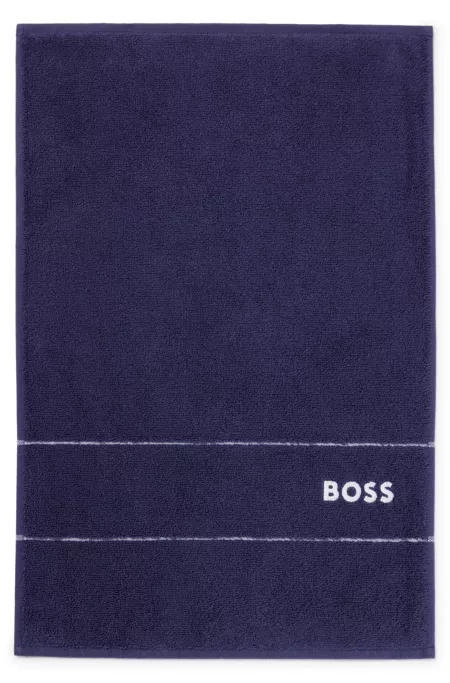 Cotton guest towel with white logo embroidery