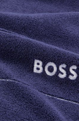 Cotton guest towel with white logo embroidery, Dark Blue