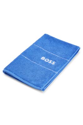 Cotton guest towel with white logo embroidery, Blue